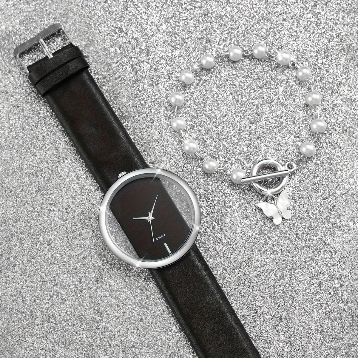 Papillon noir et blanc, montre pour femme